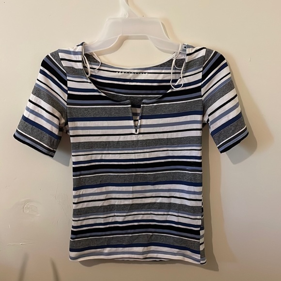 Aeropostale Blue, white, and black top. Good condition/ slight cleavage shown.